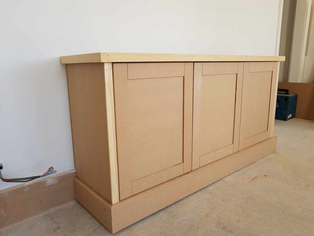 A cupboard base during the build, before painting